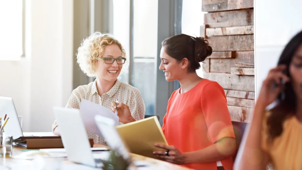 Two women registering an  ecommerce business